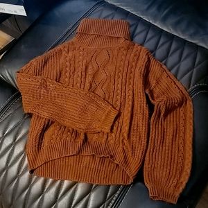 Rust orange turtleneck sweater